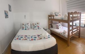 Postel nebo postele na pokoji v ubytování Casa Turbay