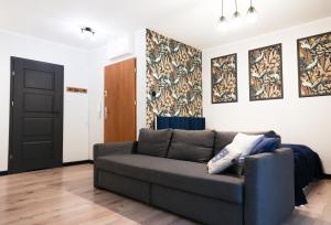 Posezení v ubytování River House - Apartament z ogródkiem