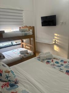 Postel nebo postele na pokoji v ubytování Casa Turbay