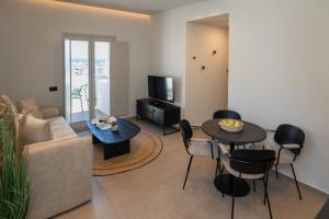 A television and/or entertainment centre at Depalyma Suites