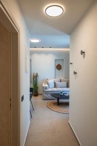 A bed or beds in a room at Depalyma Suites