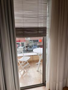 a window with a view of a table and a table at Arminda in Arguineguín +41 photos