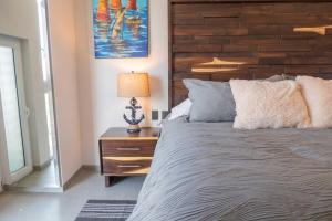 Ένα ή περισσότερα κρεβάτια σε δωμάτιο στο Pool with ocean view, gym - grupoxingo +18 φωτογραφίες