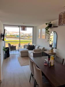 Posezení v ubytování DEPARTAMENTO DE PLAYA en San Bartolo