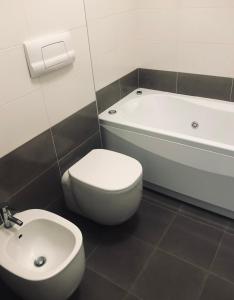 Koupelna v ubytování Stanza privata con bagno su appartamento condiviso