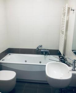 Koupelna v ubytování Stanza privata con bagno su appartamento condiviso