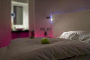 Postel nebo postele na pokoji v ubytování UNA HOTELS One Siracusa