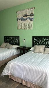 Katil atau katil-katil dalam bilik di Casa San Miguel
