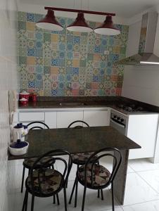 Kuchyň nebo kuchyňský kout v ubytování Apartamento em Coqueiral de Itaparica