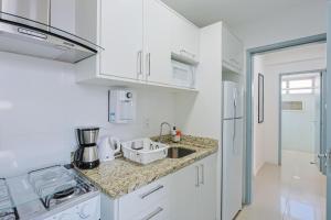 Dapur atau dapur kecil di Apto Confortável e Vista Mar no Centro