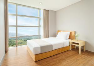 Postel nebo postele na pokoji v ubytování Hanwha Resort Gyeongju