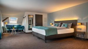 Postel nebo postele na pokoji v ubytování Holiday Inn - the niu, Rig Lübeck by IHG