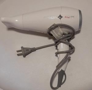 a hair dryer is attached to a wall at Decorama Vista in Dolores