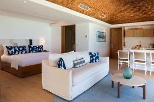 Postel nebo postele na pokoji v ubytování Baby Plage Bora Bora