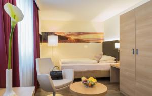 Postel nebo postele na pokoji v ubytování Hotel Holl
