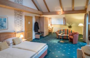 Postel nebo postele na pokoji v ubytování Hotel Holl + 25 fotografií