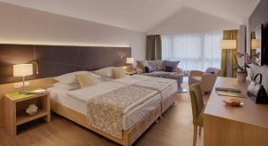 Postel nebo postele na pokoji v ubytování Hotel Holl