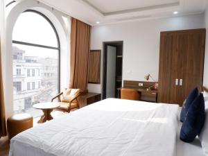 Katil atau katil-katil dalam bilik di An Khang Hotel +73 gambar