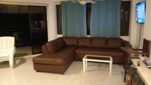 Posezení v ubytování Departamento 4 habitaciones 12 personas vista al mar 8vo piso Playa Almendro