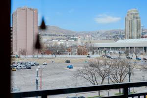 a view from a window of a parking lot at Convention Ctr Lux 2BR Pool,Htub,Gym,Theatre,Pkg in Salt Lake City +35 photos