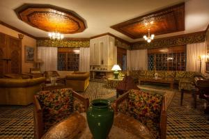 Posezení v ubytování Riad Alhambra