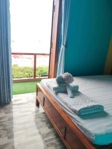 Ένα ή περισσότερα κρεβάτια σε δωμάτιο στο Homstay Trường Kép