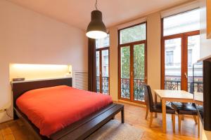 Voodi või voodid majutusasutuse Because the Night city lodge toas