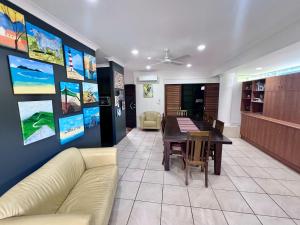 a living room with a couch and a table at SpiritU at Mission Beach in Mission Beach +22 photos