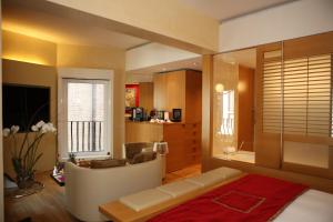 Postel nebo postele na pokoji v ubytování Bio Hotel Raphael - Relais & Châteaux
