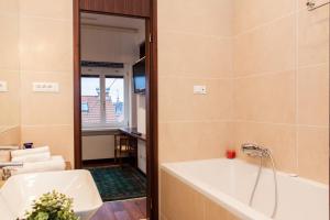 Phòng tắm tại Centroom Apartments Zagreb +69 ảnh
