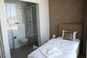 Koupelna v ubytování Residence Appartements + 37 fotografií