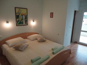 Ένα ή περισσότερα κρεβάτια σε δωμάτιο στο Guesthouse Iva