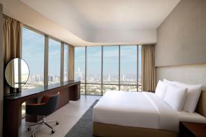 Postel nebo postele na pokoji v ubytování Hotel Local Dubai at Jumeirah Village Triangle + 27 fotografií