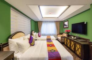 TV a/nebo společenská místnost v ubytování Fansipan View Hotel