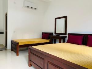 Ένα ή περισσότερα κρεβάτια σε δωμάτιο στο The Paramount Lodge