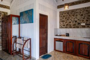 Kuchyň nebo kuchyňský kout v ubytování Serenity Beach Cabanas + 37 fotografií