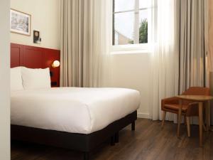 DoubleTree by Hilton Sittard客房内的一张或多张床位
