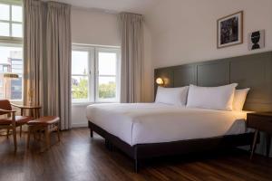 DoubleTree by Hilton Sittard客房内的一张或多张床位