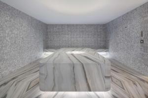 Andaz Doha, by Hyattにあるベッド