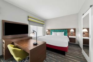 Postel nebo postele na pokoji v ubytování Hampton Inn & Suites Sherman