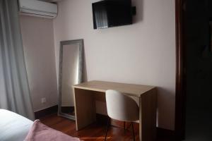 TV a/nebo společenská místnost v ubytování Hotel Bermeo
