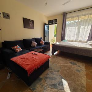 Postel nebo postele na pokoji v ubytování Breezy homes