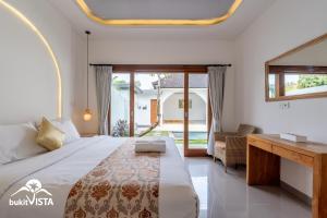 Postel nebo postele na pokoji v ubytování Kubu Mesari Homestay by Bukit Vista + 30 fotografií