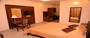 Katil atau katil-katil dalam bilik di Surkhab Tourist Resort
