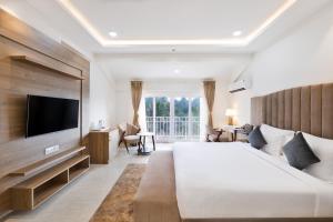 TV o dispositivi per l'intrattenimento presso White Wharf Beach Resort Morjim Goa