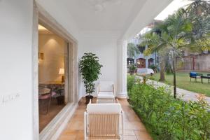 Giardino di White Wharf Beach Resort Morjim Goa