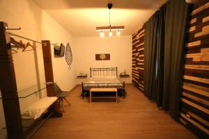A bed or beds in a room at Camurria Sicilian B&B