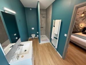 Koupelna v ubytování OXXOTEL & Spa