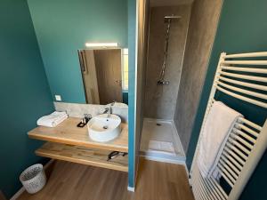 Koupelna v ubytování OXXOTEL & Spa