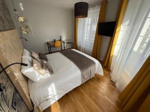 Postel nebo postele na pokoji v ubytování OXXOTEL & Spa